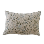 Decorative pillow with floral pattern on a beige background